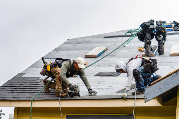 Professional Emergency Roof Repair technician working in Coopersville, MI